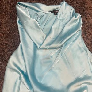 Turquoise color sleeveless blouse.  Beautiful. Cowl neck.